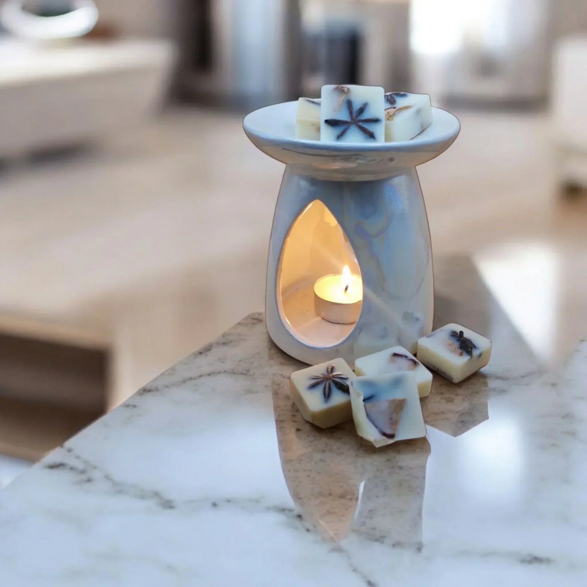 Luxury aroma melt blending mandarin citrus with warm sandalwood